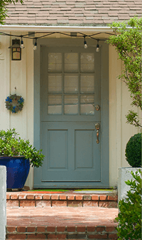 woman drinking coffee in kitchen